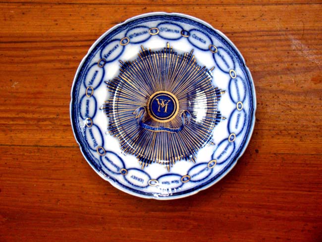 A magnificent flow blue plate adapted from the dinner service given to Martha Washington in 1796